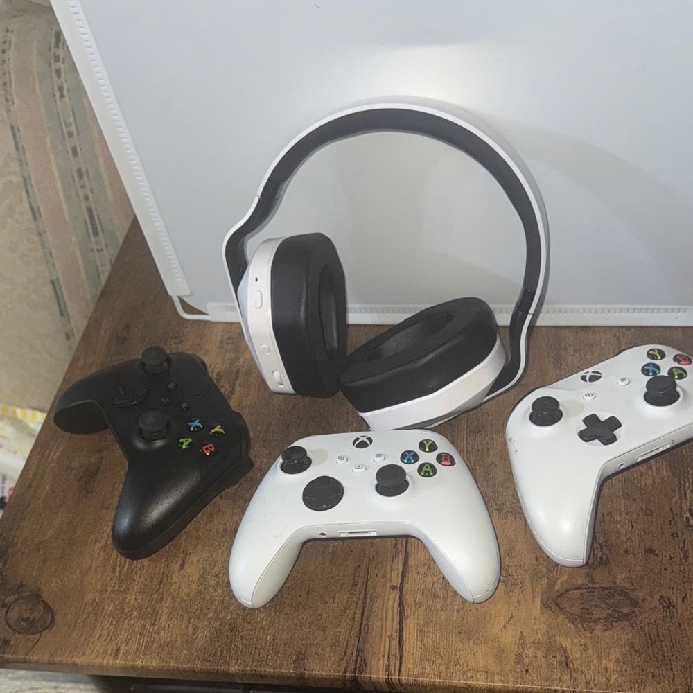 Microsoft White and Black Xbox Controllers with Matching Headset